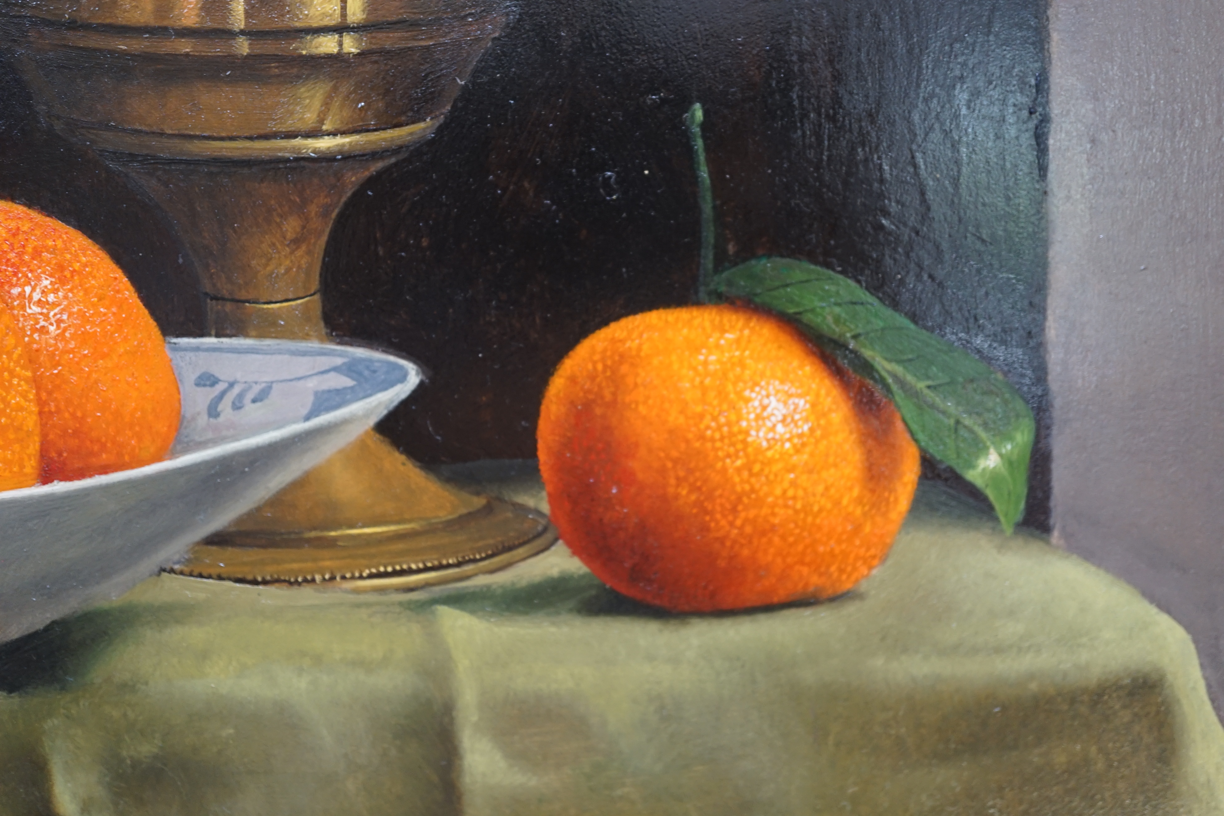 Willem Dolphyn (Belgian, 1935-2016), Still life of oranges, glassware and an ormolu mounted vase upon a draped table, oil on panel, 49 x 58cm